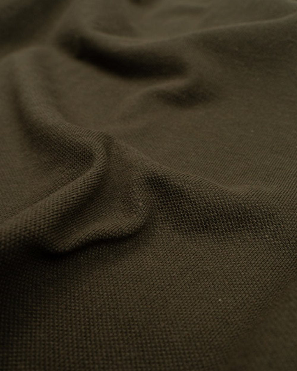 Green coloured Jack Pyke Sporting Polo Shirt on white background