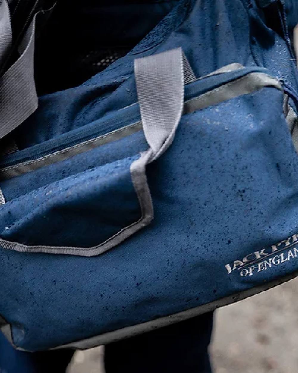 Blue coloured Jack Pyke Sporting Shoulder Bag on blurry background