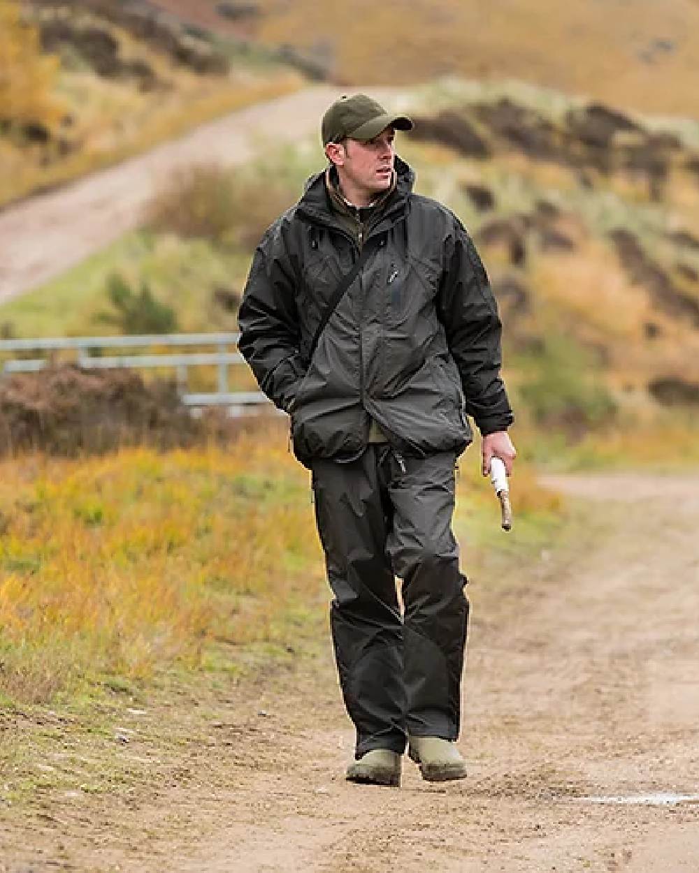 Hunter Green coloured Jack Pyke Technical Featherlite Jacket on mountain background