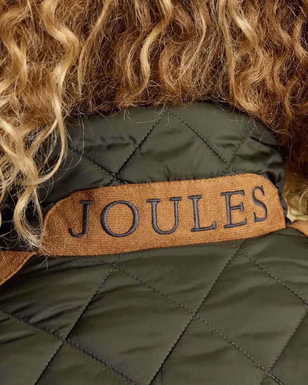 Khaki Green Coloured Joules Braemar Luxe Jacket On A White Background