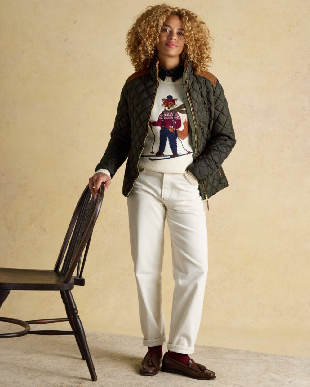 Khaki Green Coloured Joules Braemar Luxe Jacket On A Wall Background