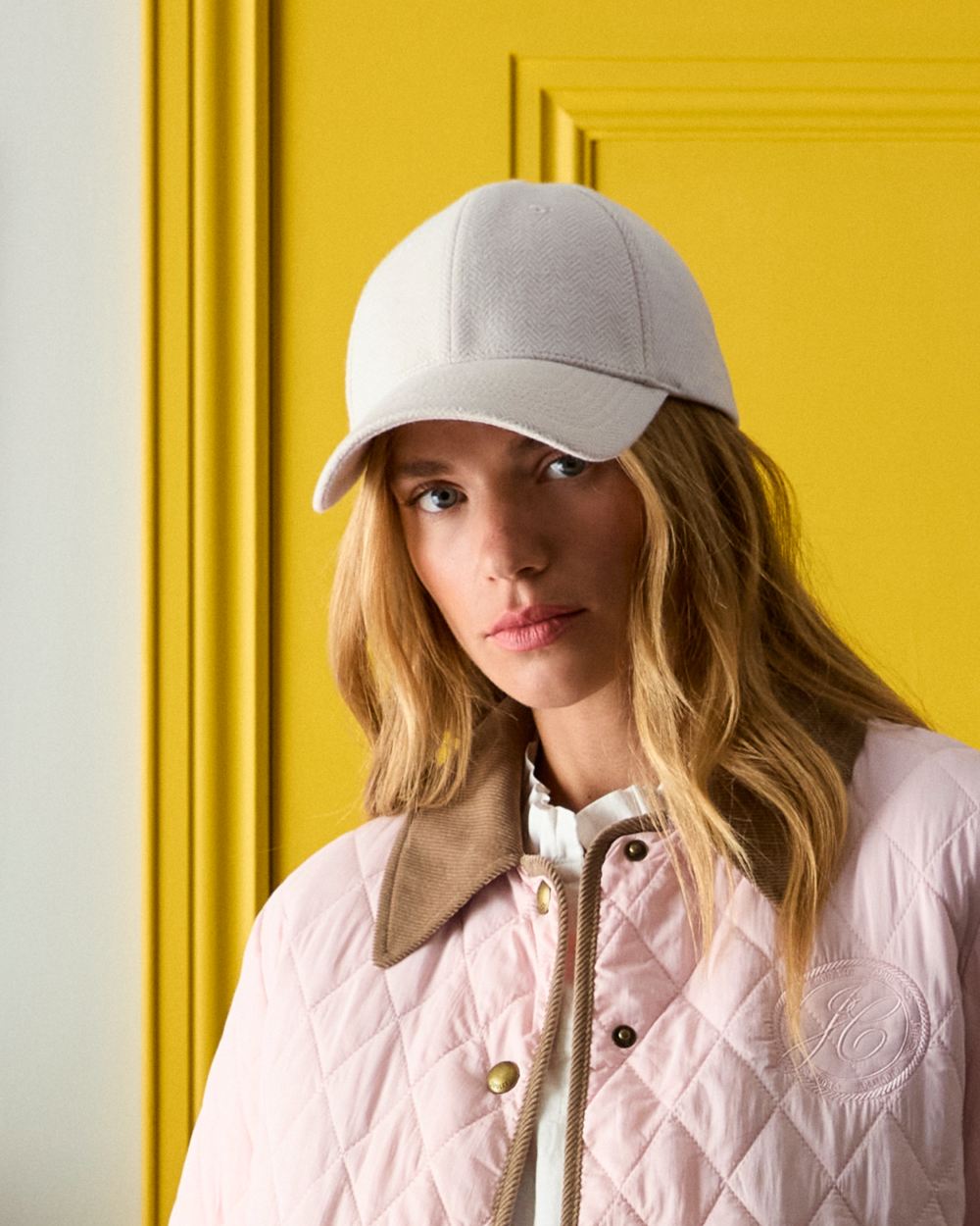 Oatmeal coloured Joules Daley Herringbone Cap on door background