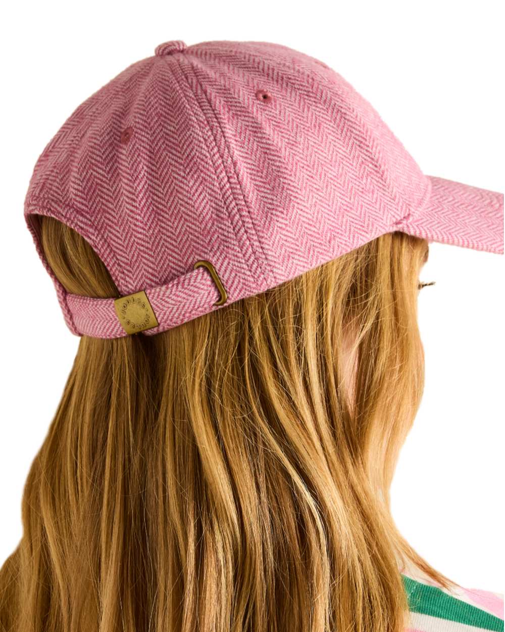 Pink coloured Joules Daley Herringbone Cap on white background