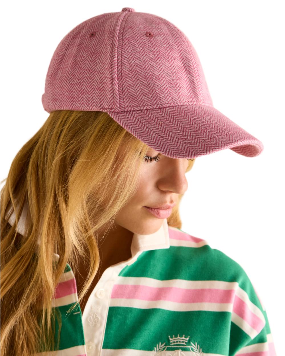 Pink coloured Joules Daley Herringbone Cap on white background