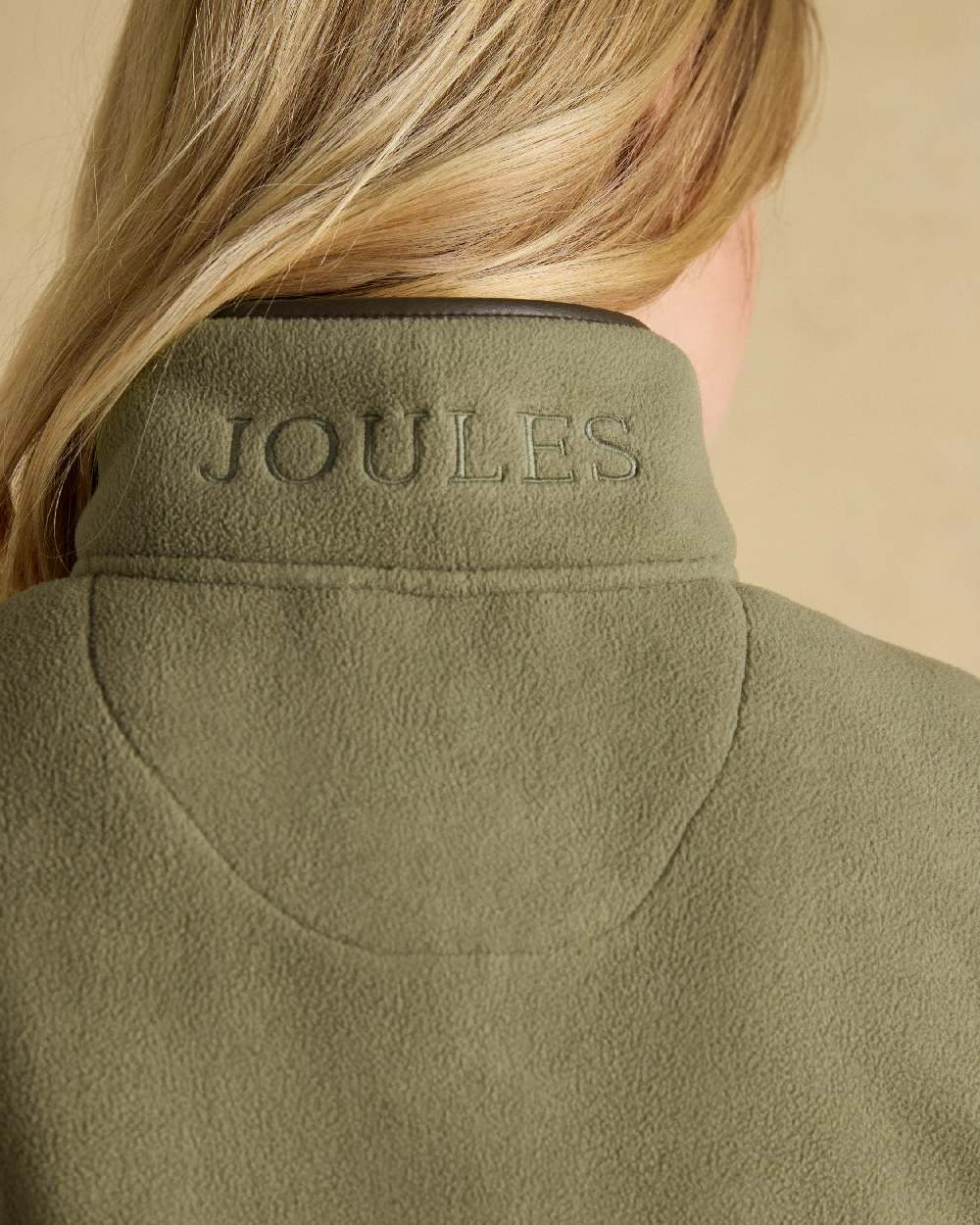 Light Green coloured Joules Heritage Longline Gilet on tan background