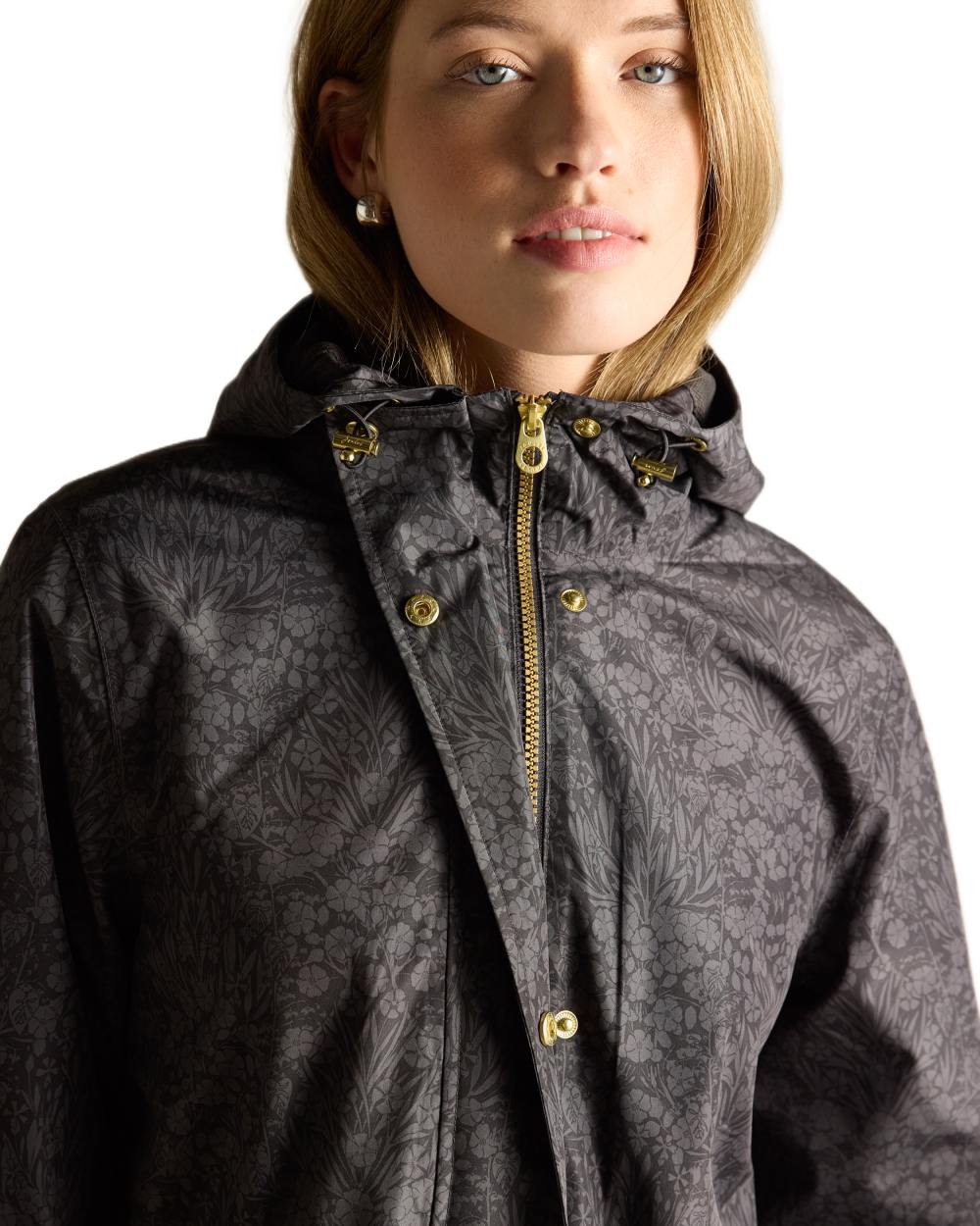 Black Coloured Joules Holkham Waterproof Packable Raincoat With Hood on white background