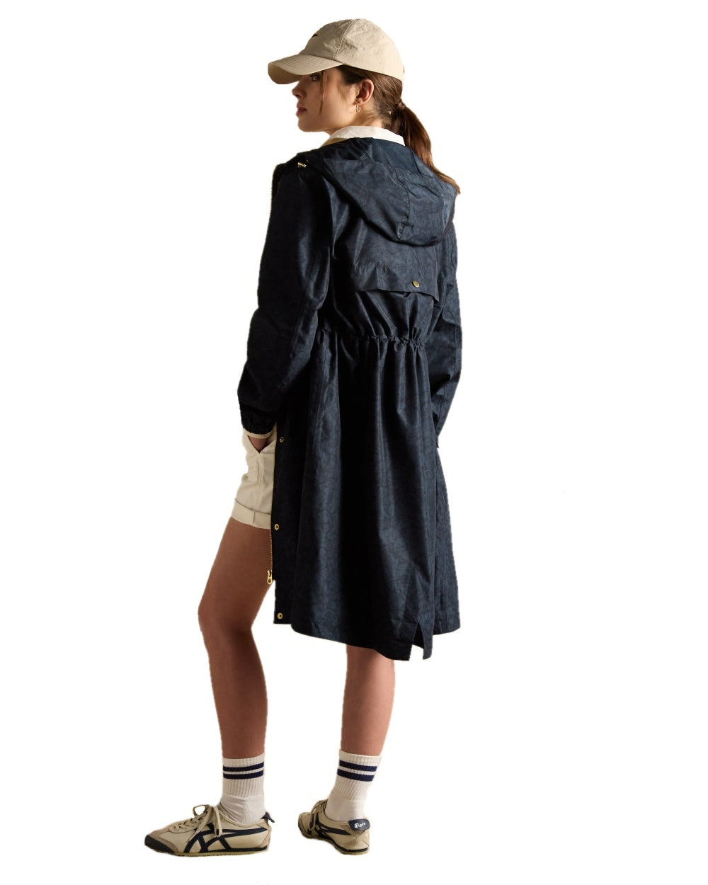 Navy Paisley coloured Joules Holkham Waterproof Packable Raincoat With Hood on white background