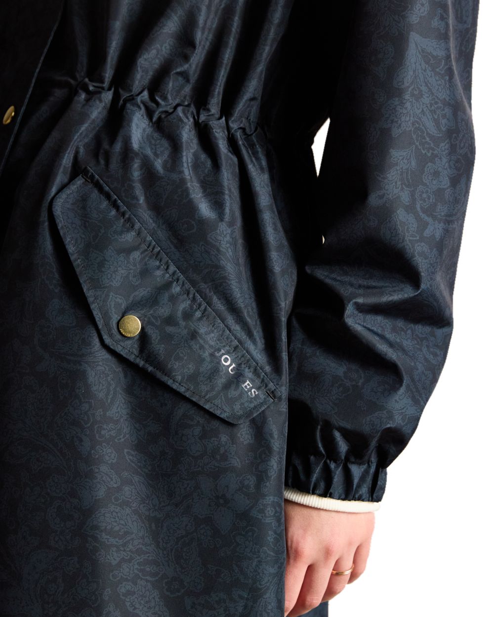 Navy Paisley coloured Joules Holkham Waterproof Packable Raincoat With Hood on white background