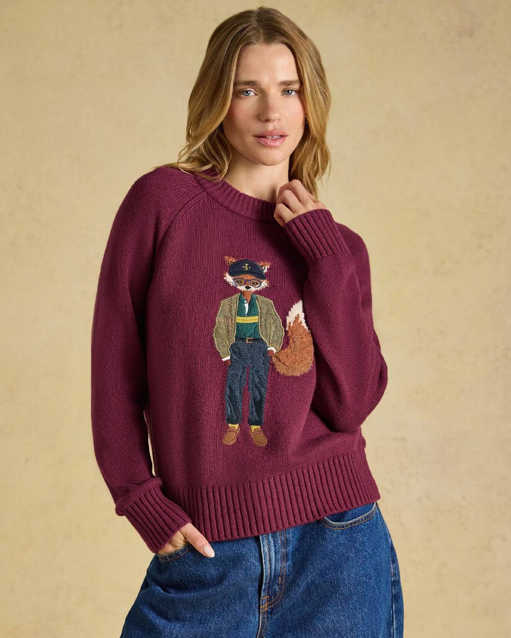 Burgundy Red Coloured Joules Jonty Intarsia Knit Jumper on beige background