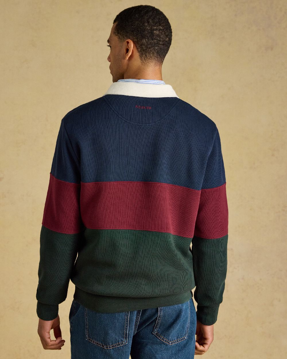 Green Navy Coloured Joules Mens French Rib Rugby Long Sleeve Sweatshirt on Beige Background