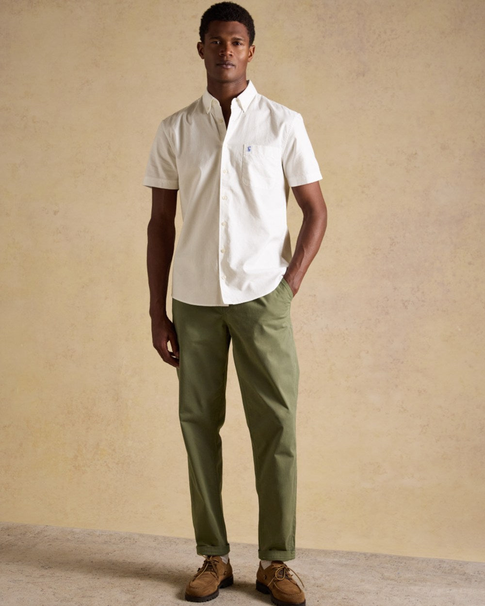 White coloured Joules Mens Oxford Short Sleeve Classic Fit Cotton Shirt on wall background