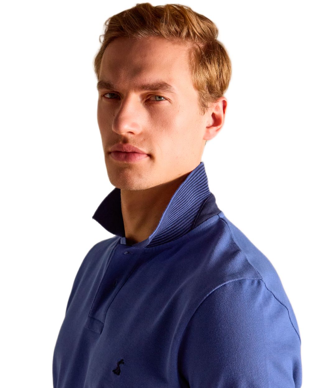 Blue coloured Joules Mens Woody Cotton Pique Polo Shirt on white background