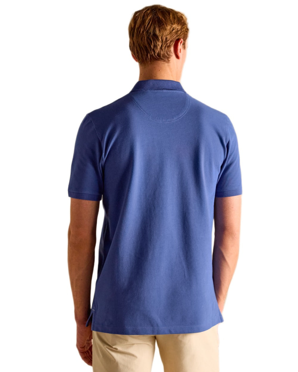 Blue coloured Joules Mens Woody Cotton Pique Polo Shirt on white background