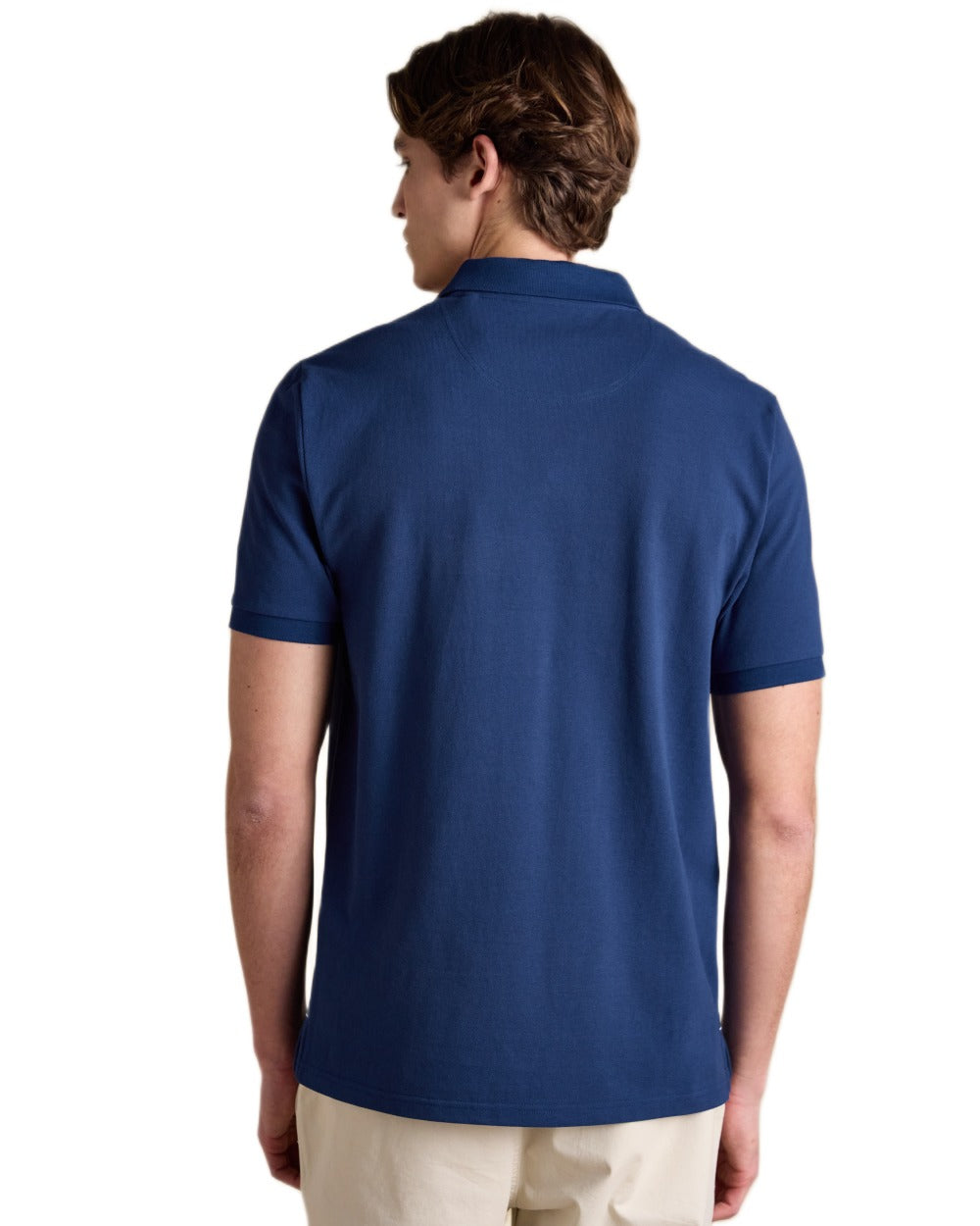 Dark Blue coloured Joules Mens Woody Cotton Pique Polo Shirt on white background