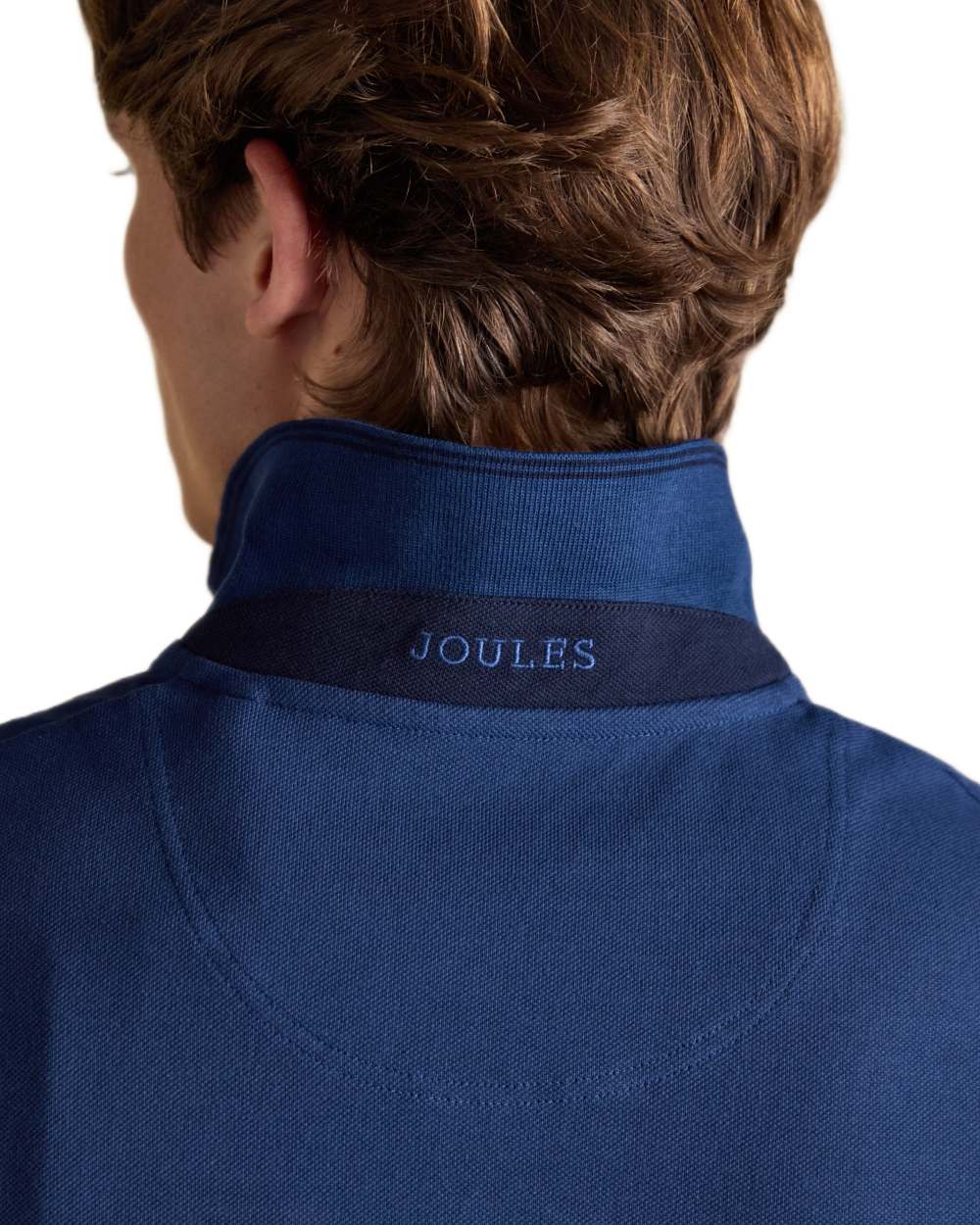 Dark Blue coloured Joules Mens Woody Cotton Pique Polo Shirt on white background