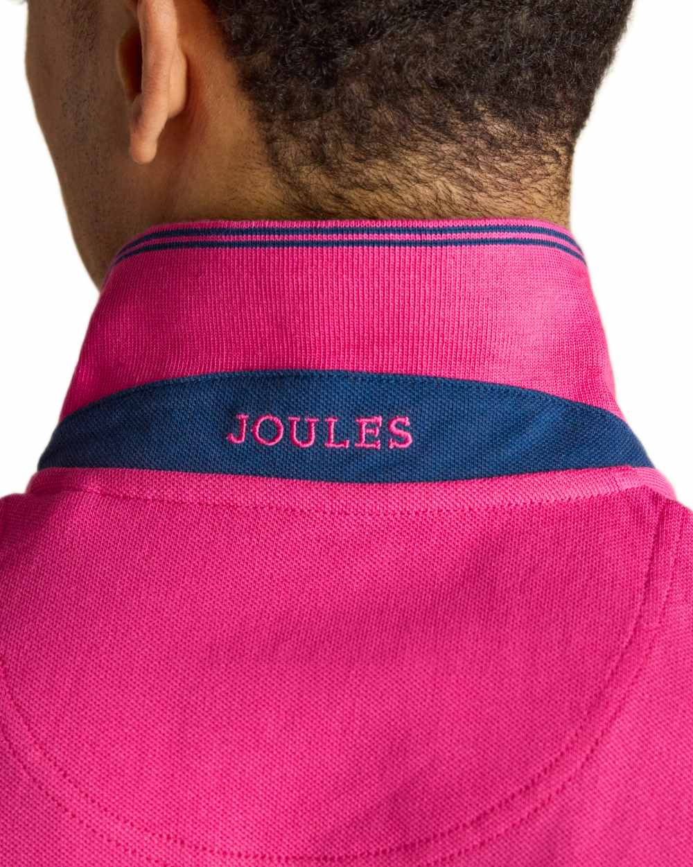 Magenta Pink coloured Joules Mens Woody Cotton Pique Polo Shirt on white background