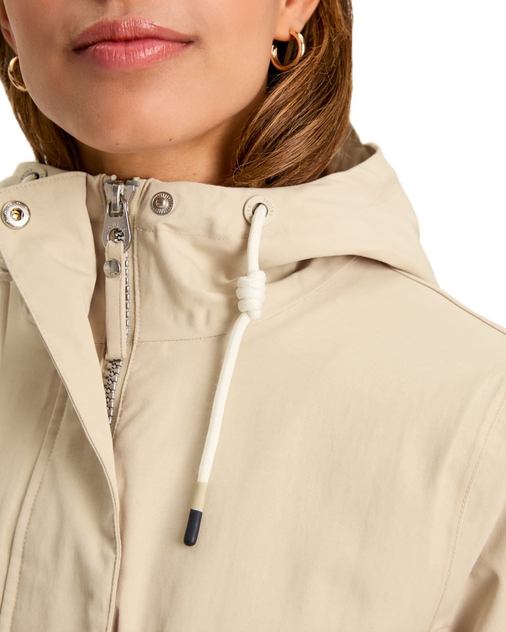 Neutral coloured Joules Portwell Waterproof Raincoat With Hood on white background