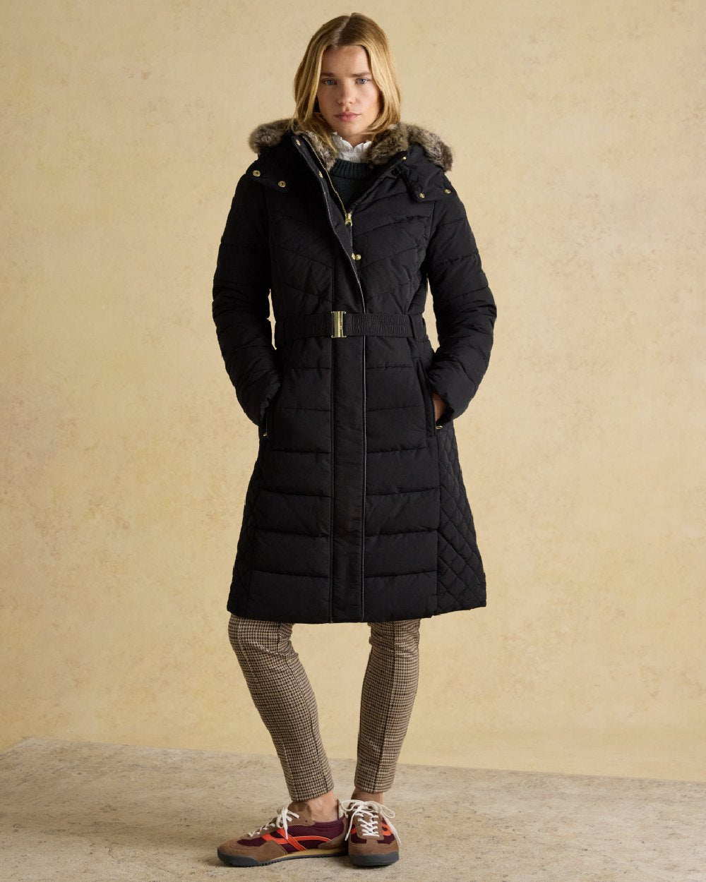 Black Coloured Joules Womens Aspen Long Showerproof Padded Coat on indoor background