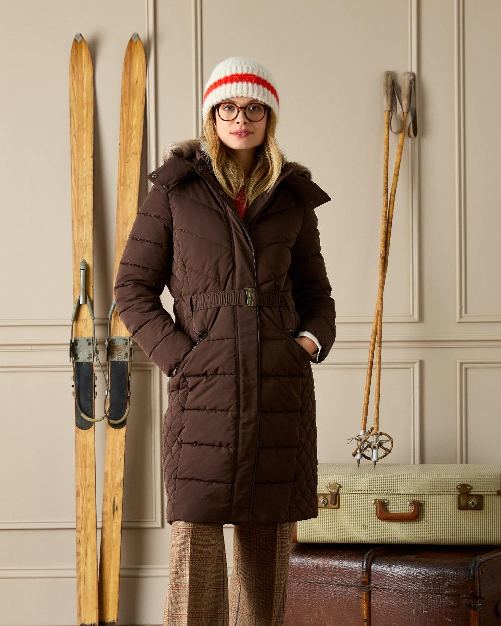 Brown Coloured Joules Womens Aspen Long Showerproof Padded Coat on indoor background