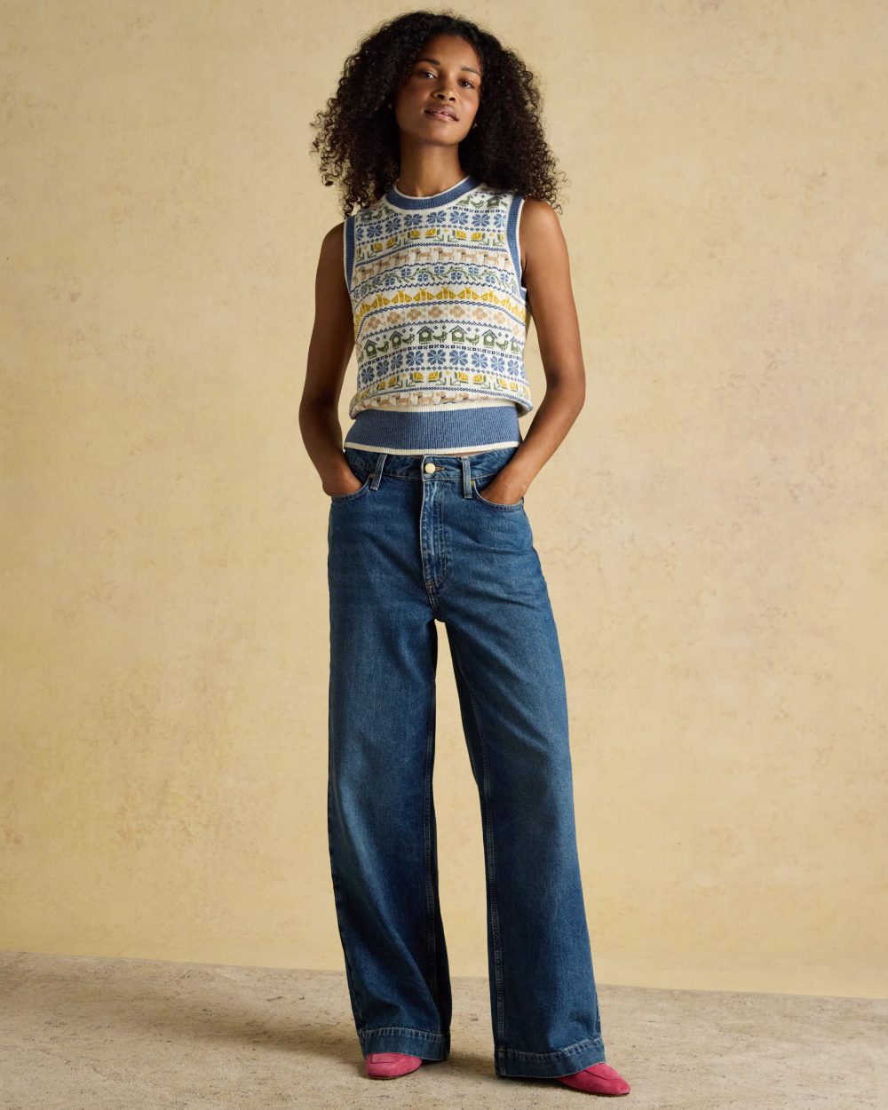 Cream Blue coloured Joules Womens Birds & Bees Knitted Crew Neck Vest on wall background