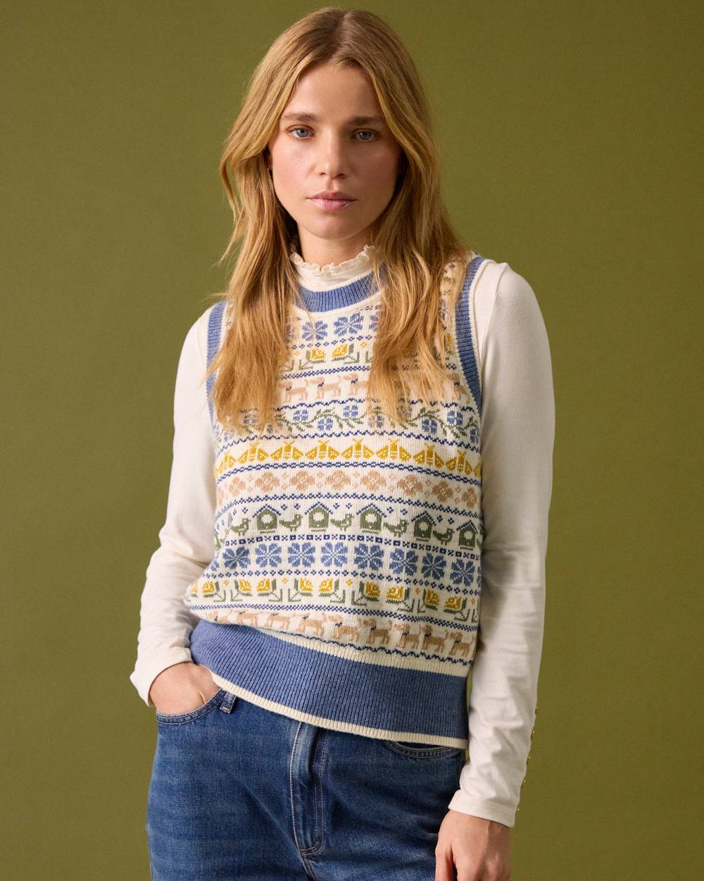 Cream Blue coloured Joules Womens Birds & Bees Knitted Crew Neck Vest on wall background