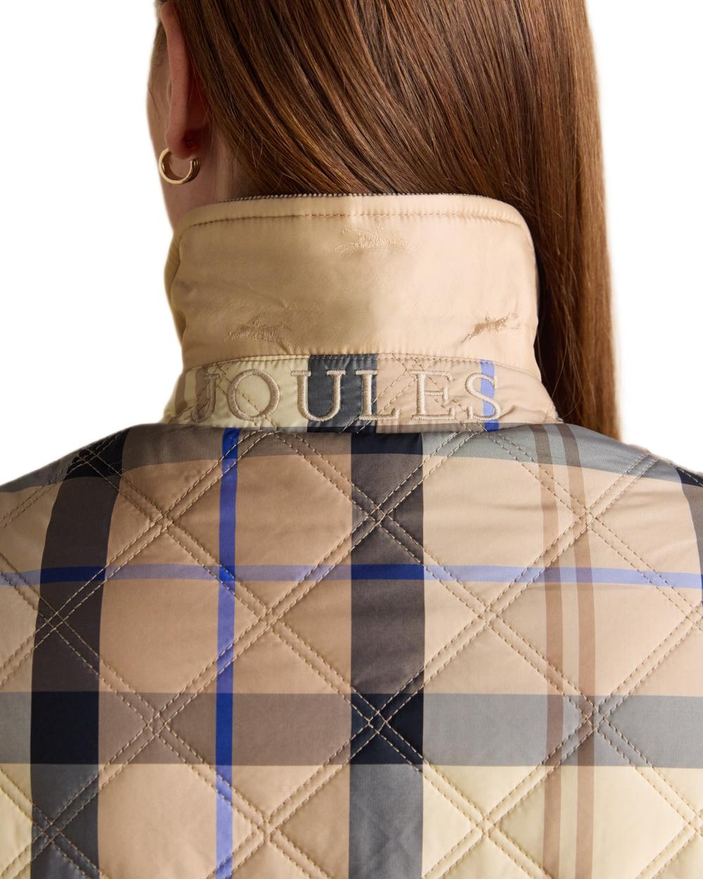 Brown check coloured Joules Womens Harrogate Showerproof Diamond Quilted Barn Jacket on white background