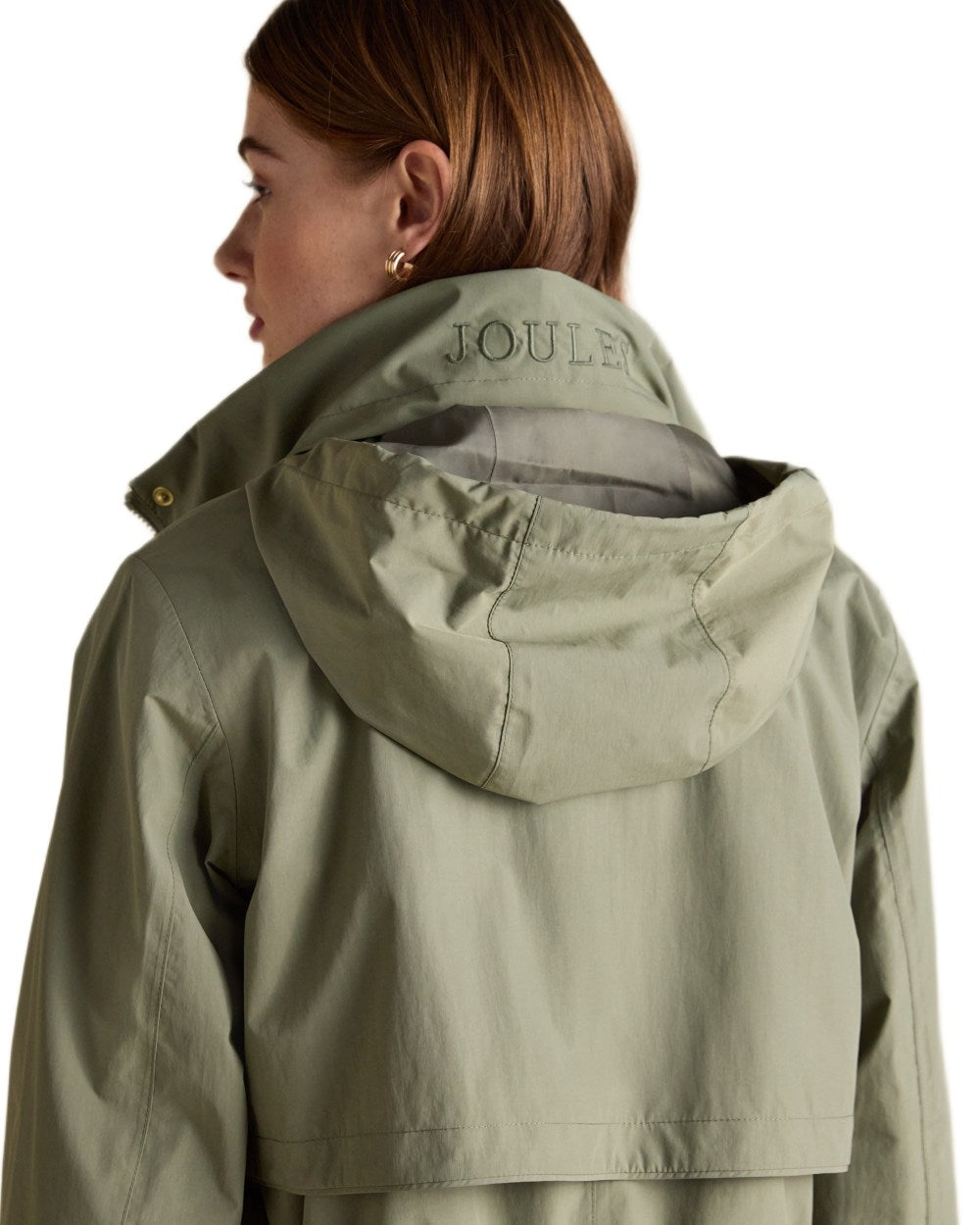 Khaki Green coloured Joules Womens Hensley Waterproof Longline Coat with Packable Hood on white background