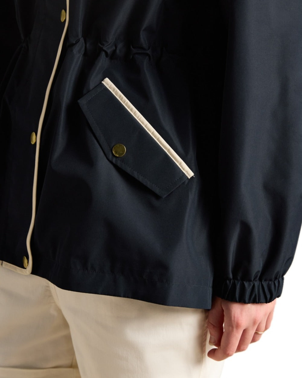 Navy coloured Joules Womens Holt Short Packable Raincoat on white background