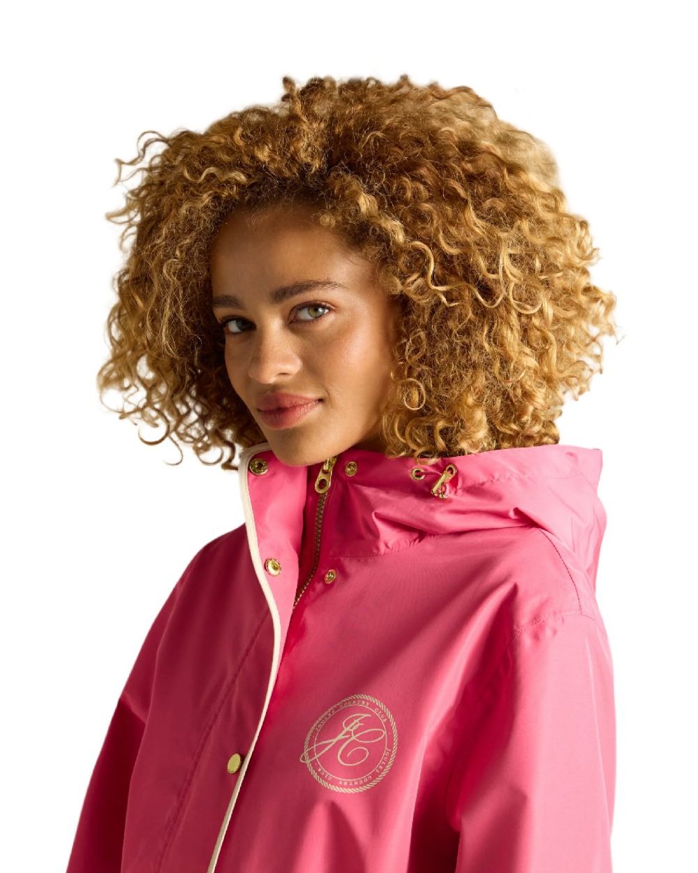 Pink coloured Joules Womens Holt Short Packable Raincoat on white background