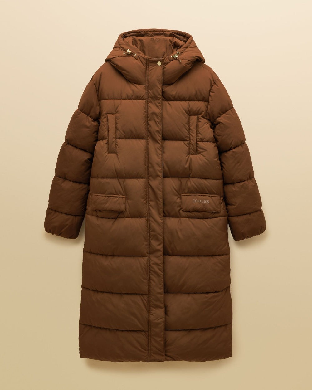 Brown Coloured Joules Womens Matchday Toffee Longline Showerproof Coat on Cream Background