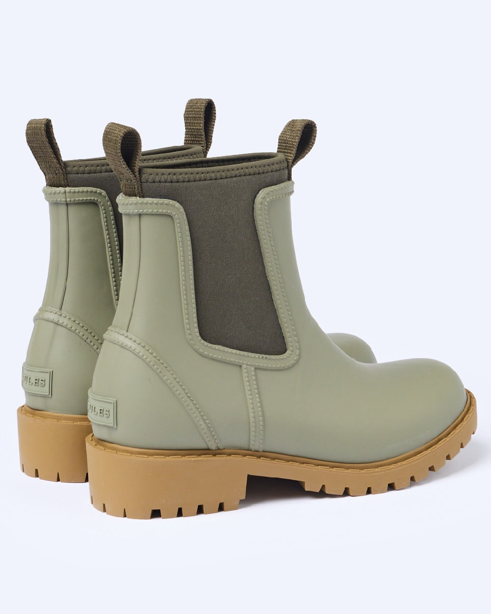 Khaki Green coloured Joules Womens Oakfield Short Neoprene Lined Wellies on lilac background