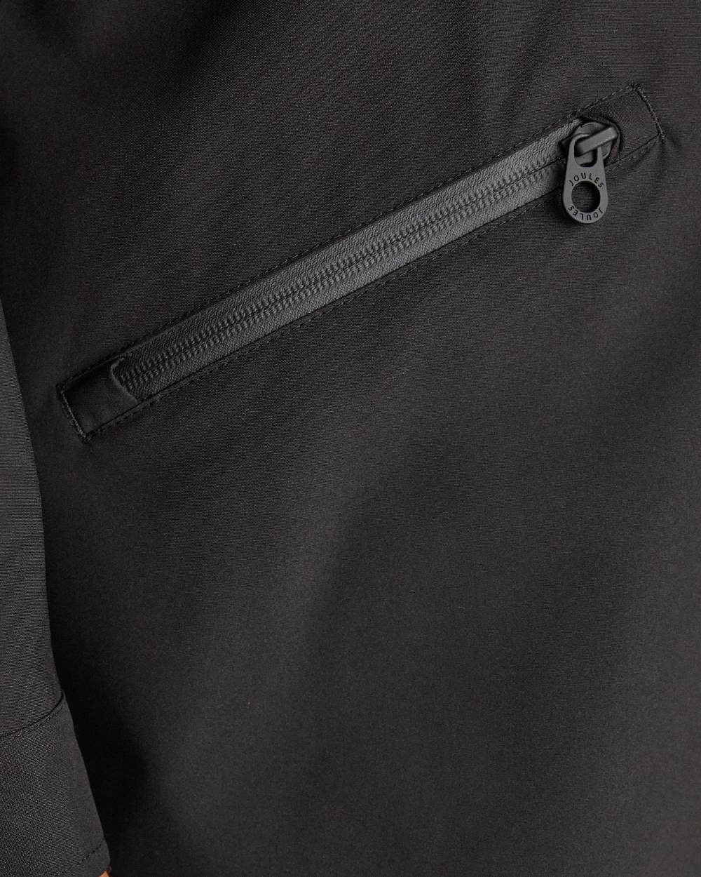 Black Coloured Joules Womens Rainaway Waterproof Longline Raincoat on white background