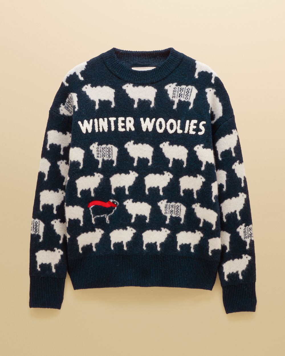 Navy Coloured Joules Womens Winter Woolies Knit on Beige Background