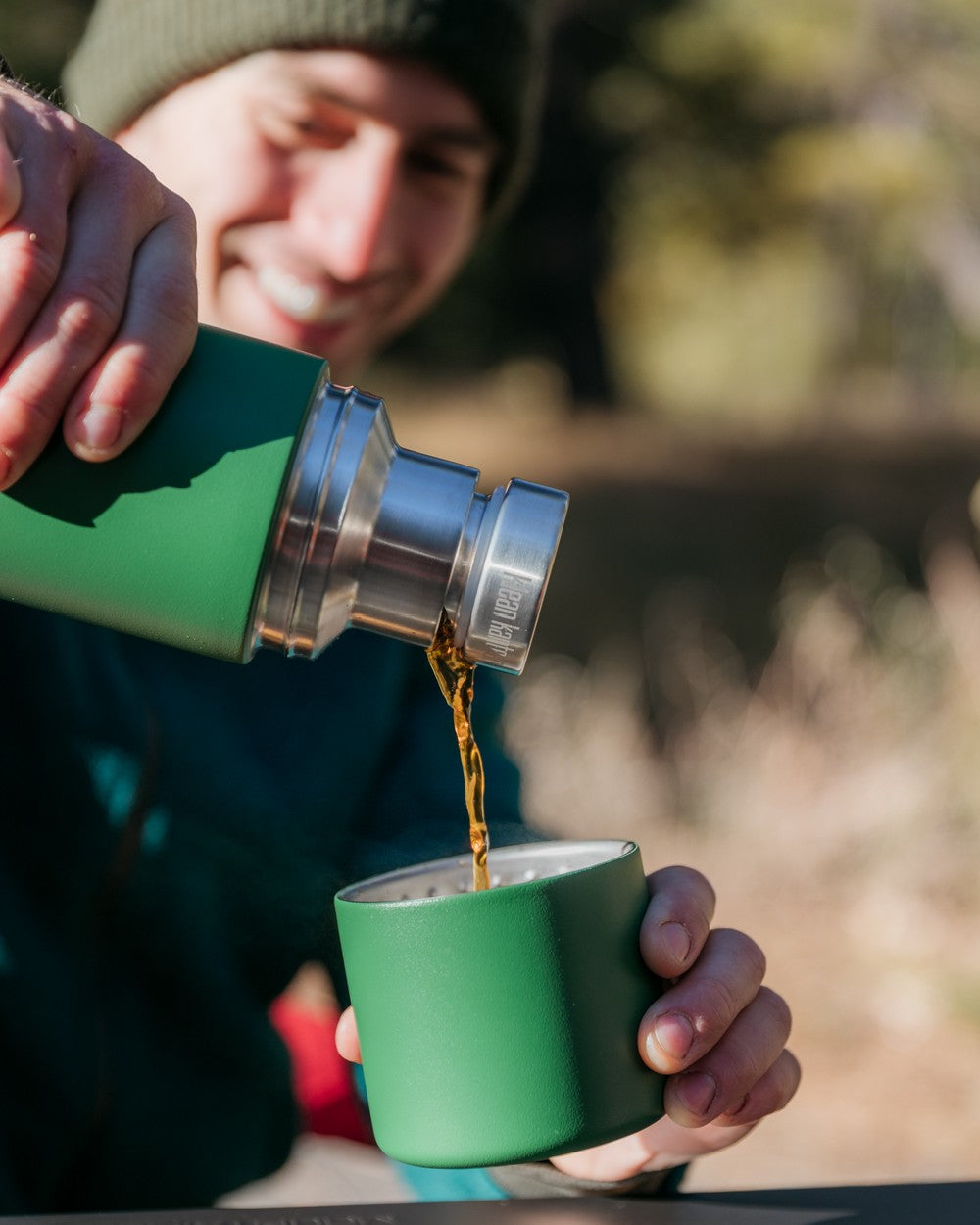 Fairway coloured Klean Kanteen Insulated TKPro Flask on blurry background