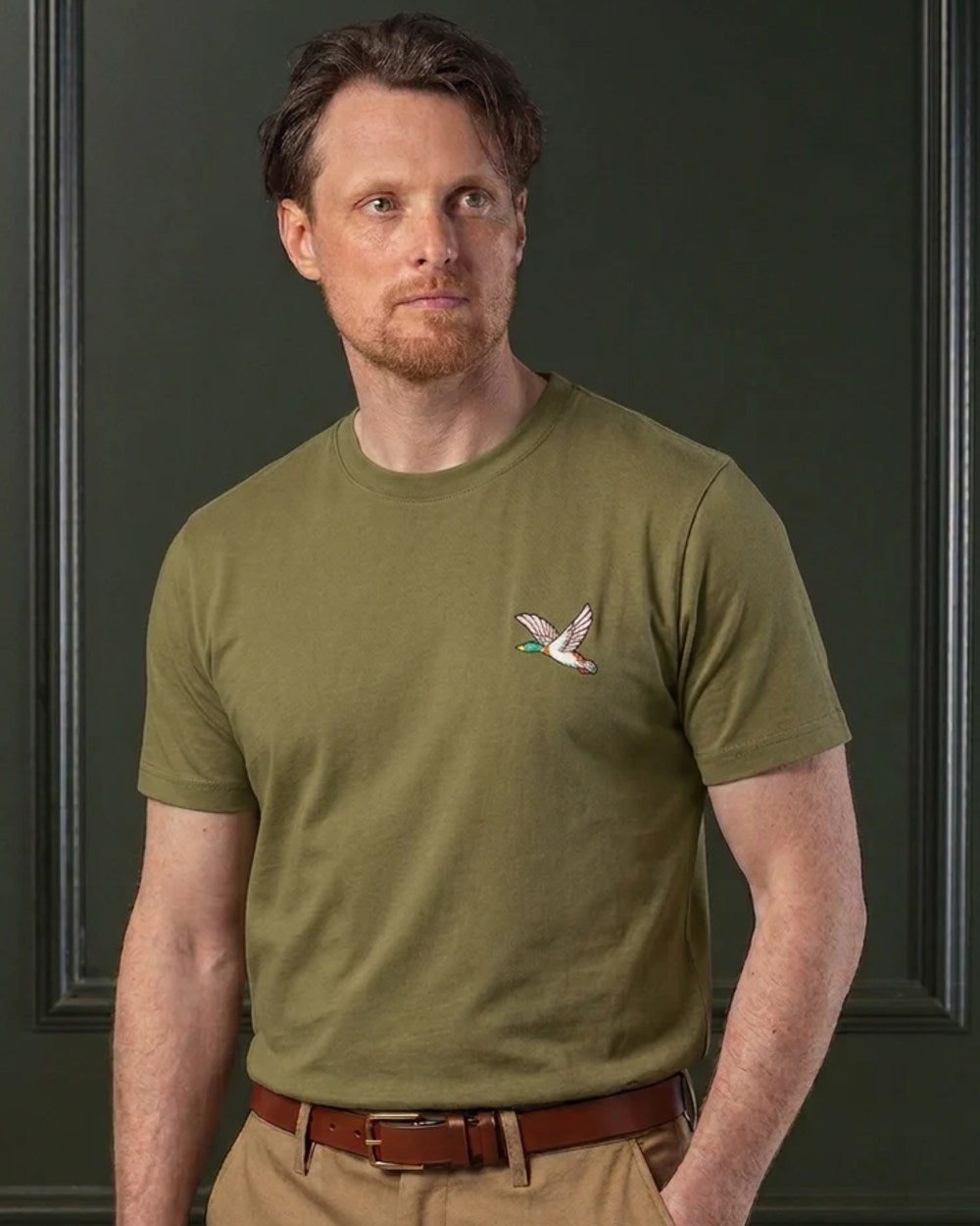Olive coloured Laksen Mens Duck Cotton T-Shirt on wall background