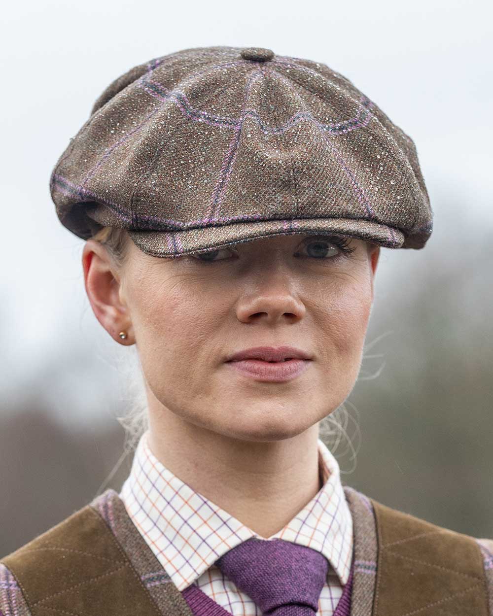 Pippa coloured Laksen Pippa Tweed Bakerboy Cap on outdoor background