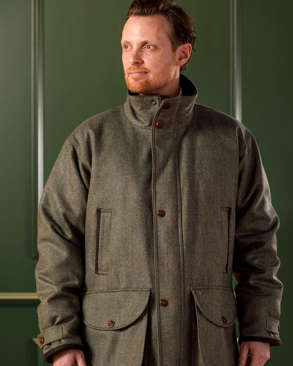 Laksen Laird Wingfield Coat With CTX On A Wall Background