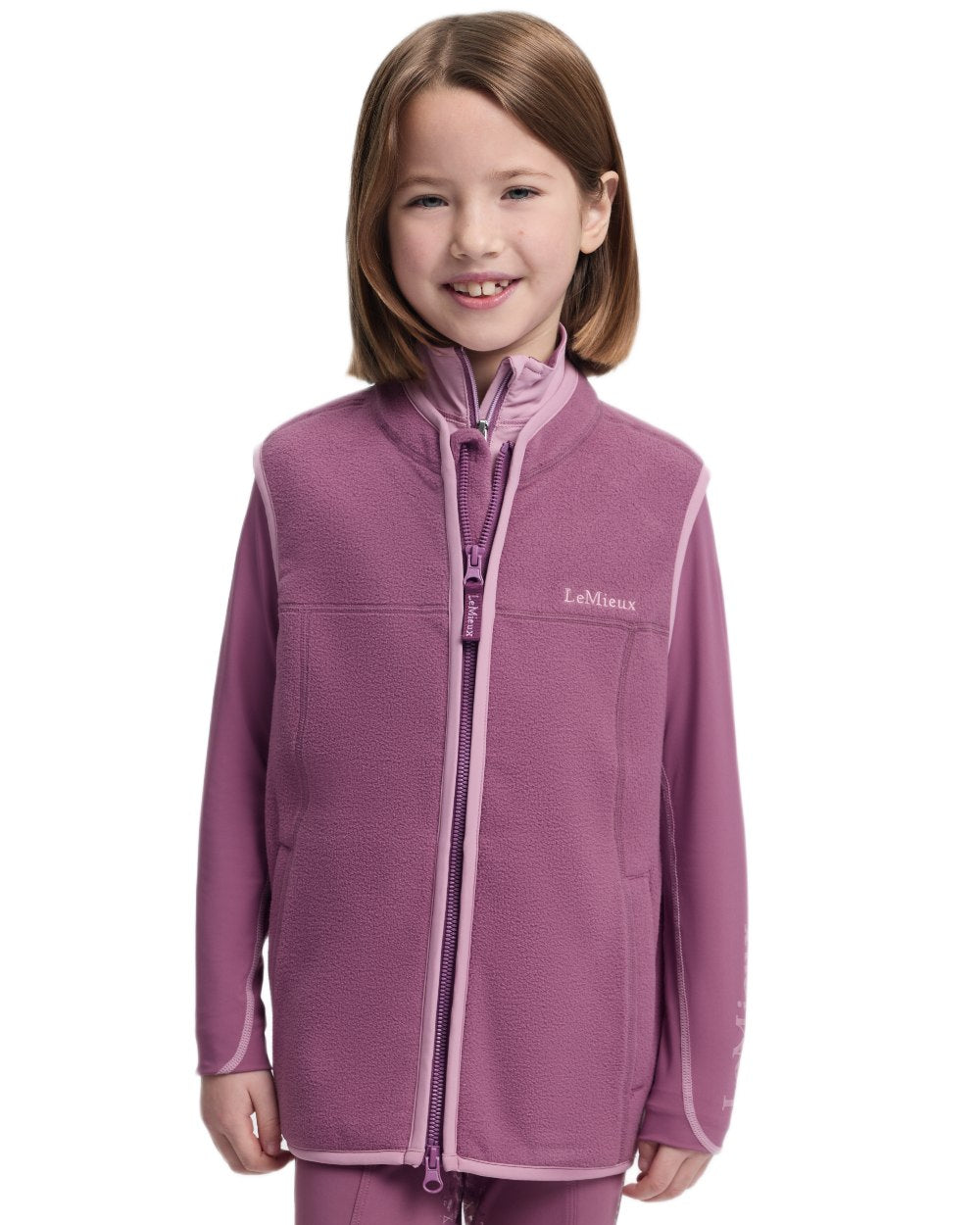 Mallow coloured LeMieux Childrens Bobbi Fleece Gilet on white background