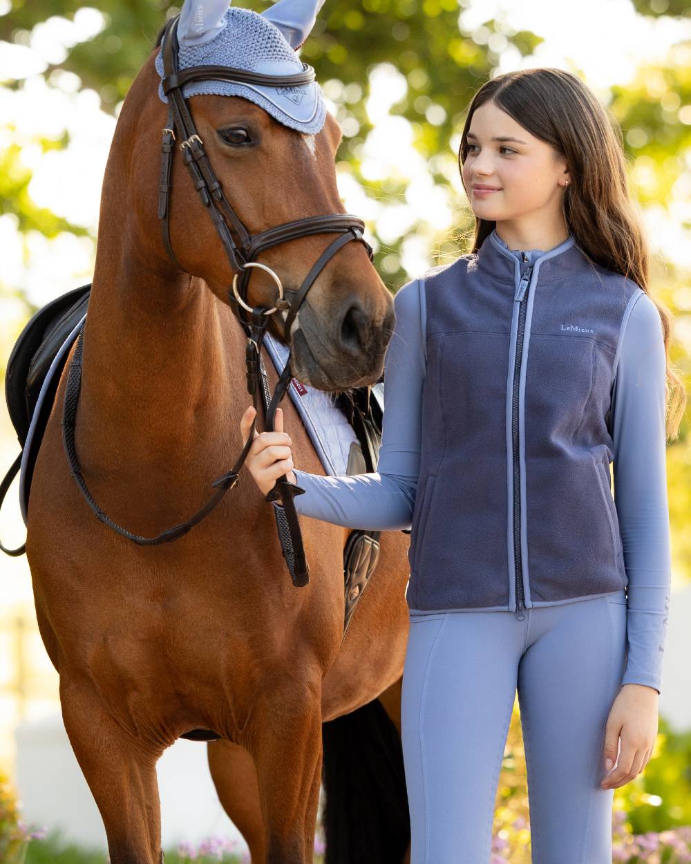 Shadow coloured LeMieux Childrens Bobbi Fleece Gilet on outdoor background