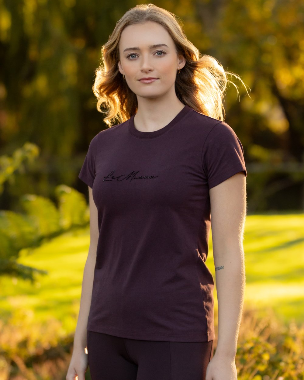 Damson coloured LeMieux Classique Sparkle T-Shirt on blurry background