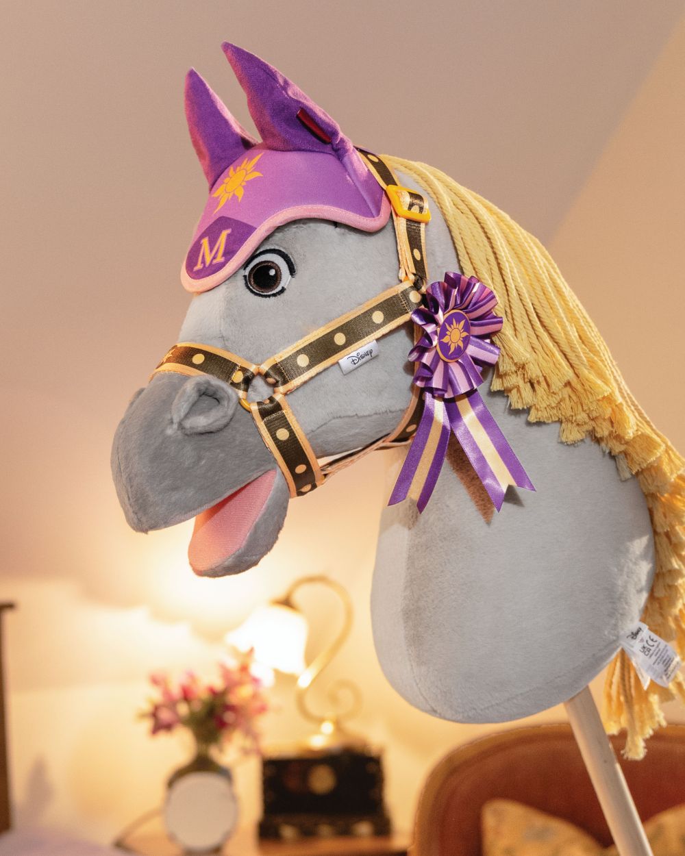 Maximus coloured LeMieux Disney Hobby Horse Maximus on house background
