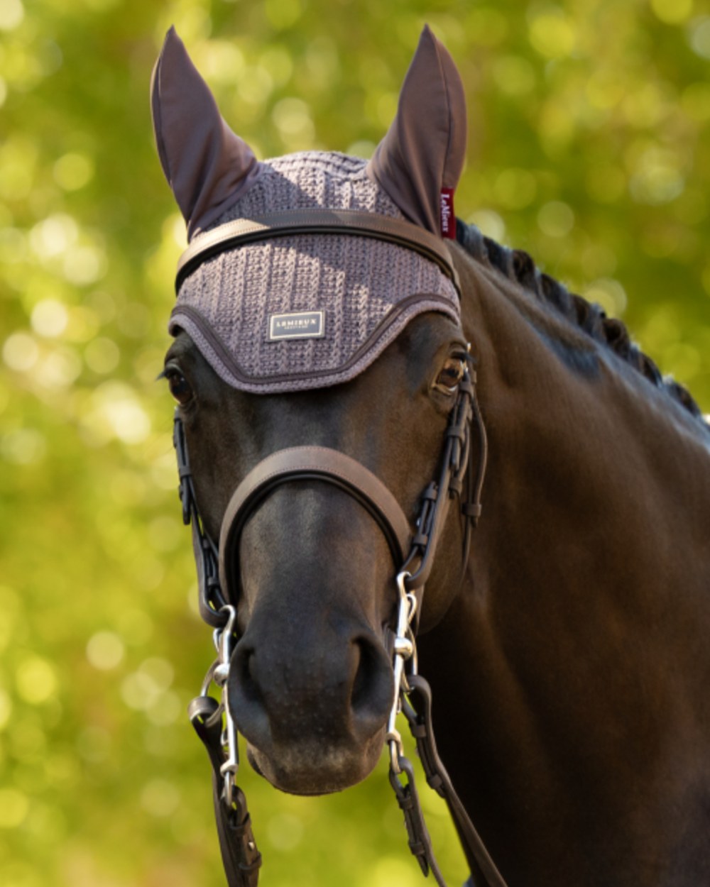 Cocoa coloured LeMieux Heritage Fly Hood on outdoor background
