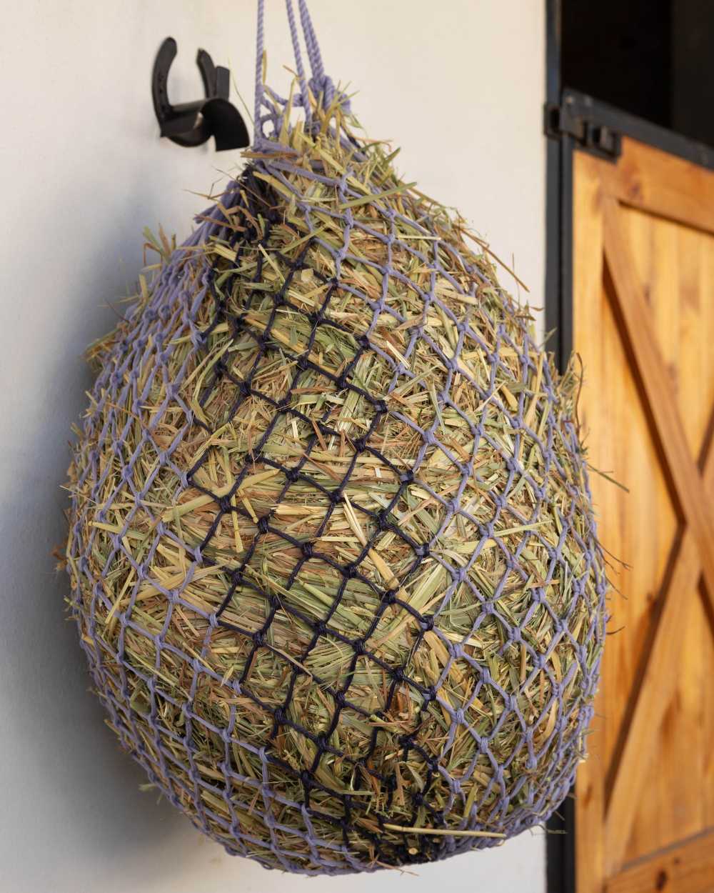 Juniper Lilac coloured LeMieux Hippo Haynet on outdoor background