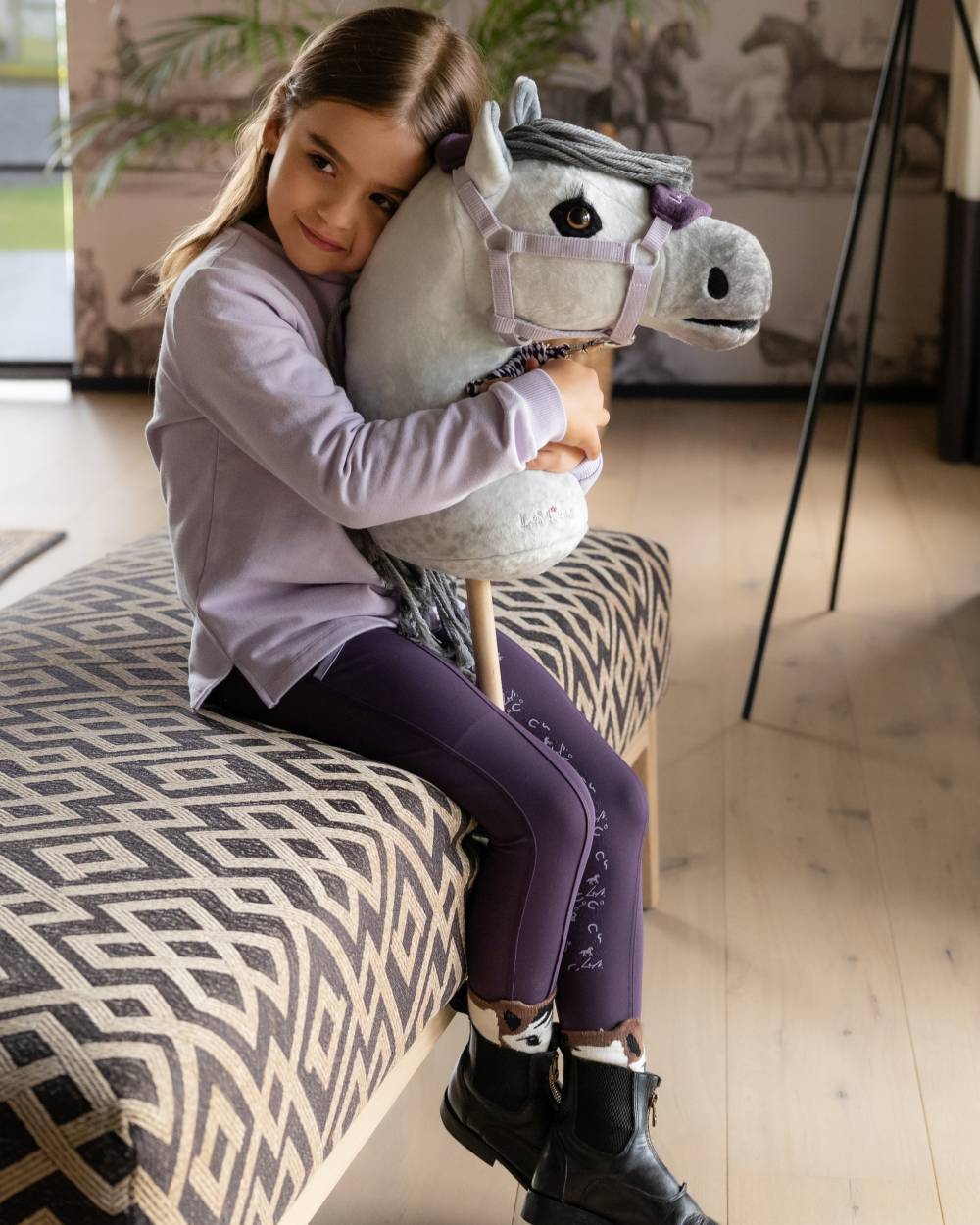 Hobby Horse Earl coloured LeMieux Hobby Horse Earl on house background