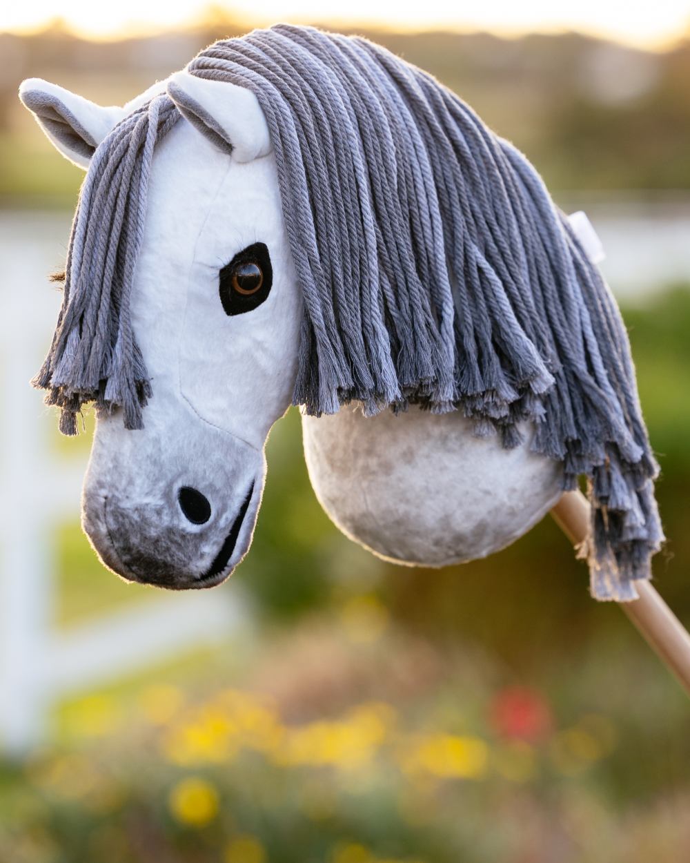 Hobby Horse Earl coloured LeMieux Hobby Horse Earl on blurry background