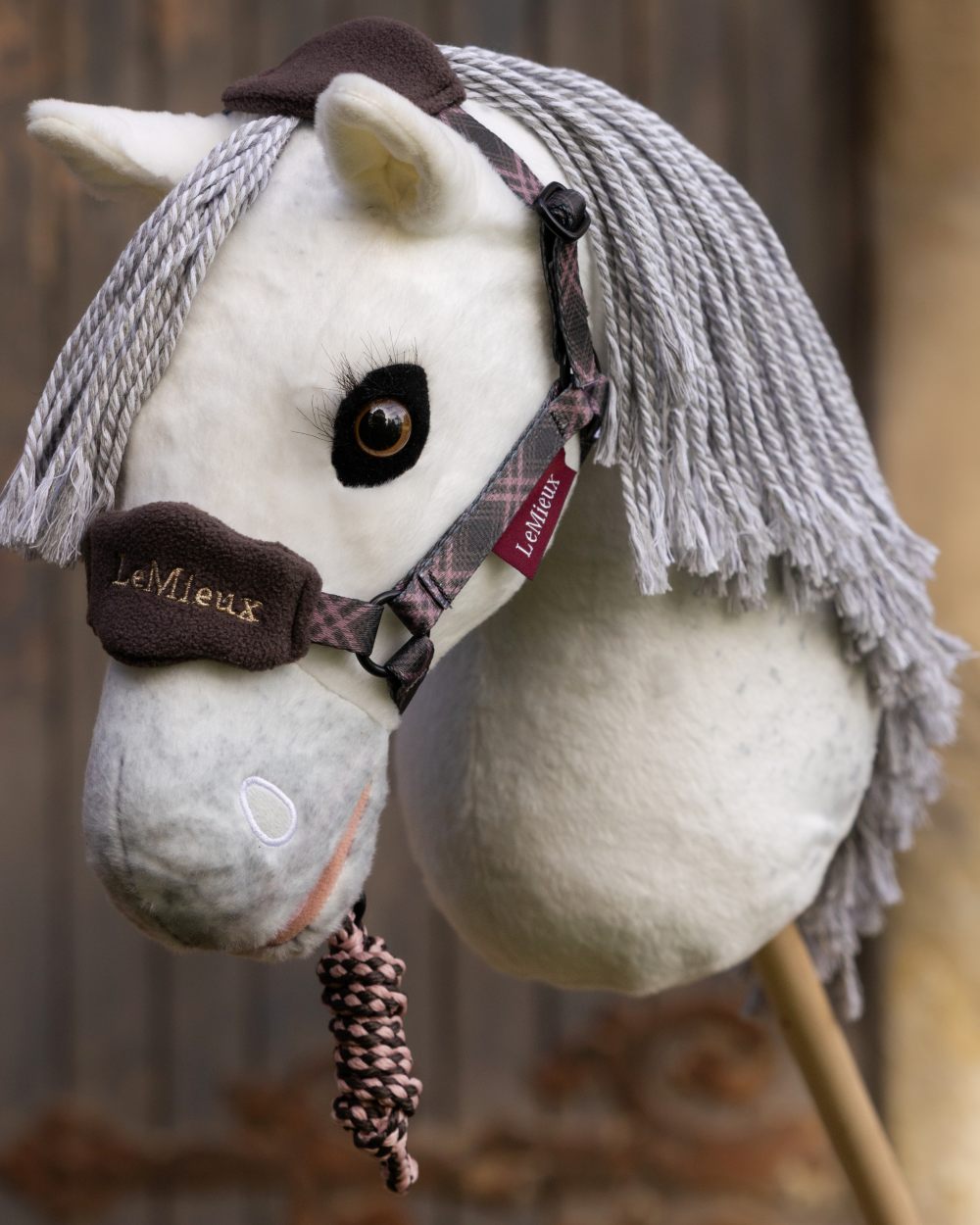 Cocoa coloured LeMieux Hobby Horse Vogue Headcollar on outdoor background