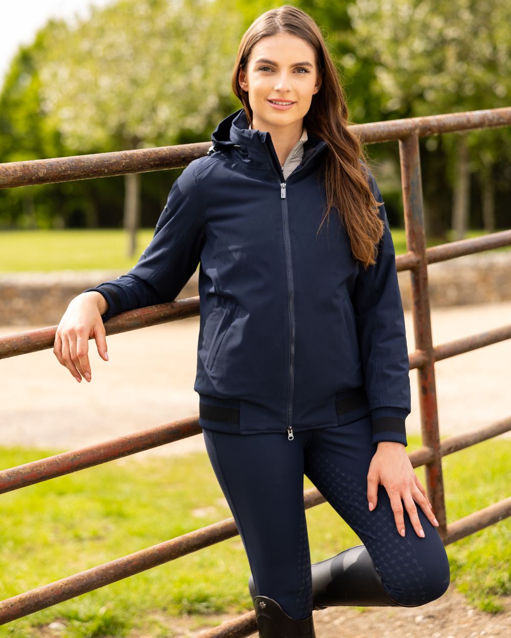 Navy coloured LeMieux Ladies Team Jacket on street background
