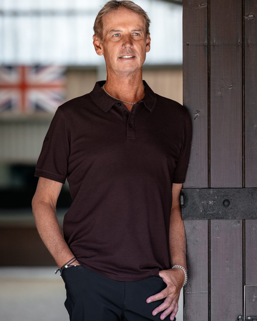 Damson coloured LeMieux Mens Classique Polo T-Shirt on stable background