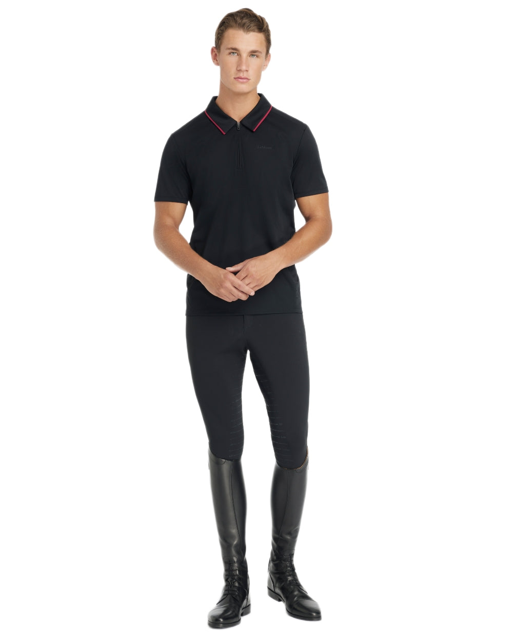 Black coloured LeMieux Mens Performance Polo T-Shirt on white background