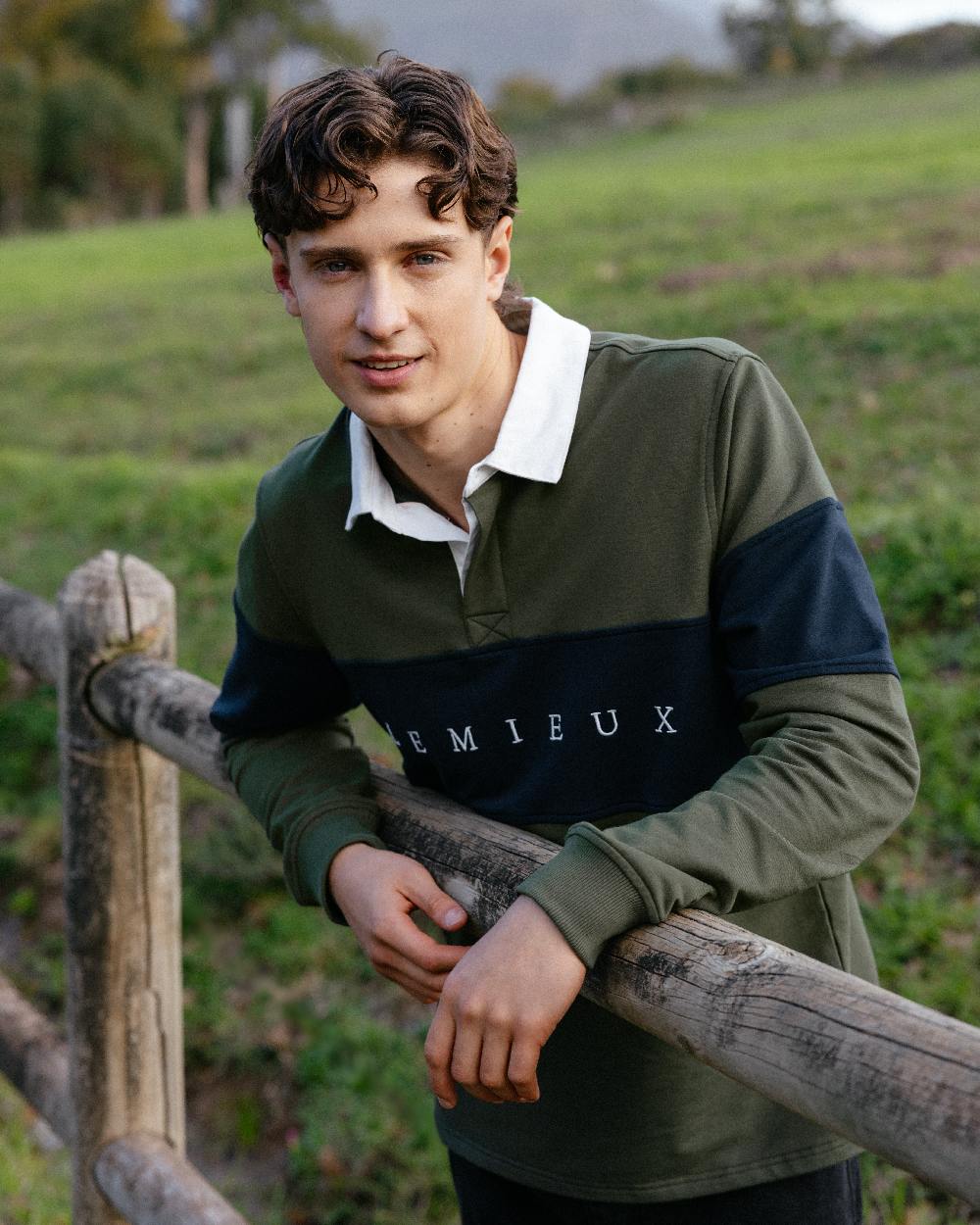 Olive Coloured LeMieux Mens Rugby Shirt on Outdoor Ground Background